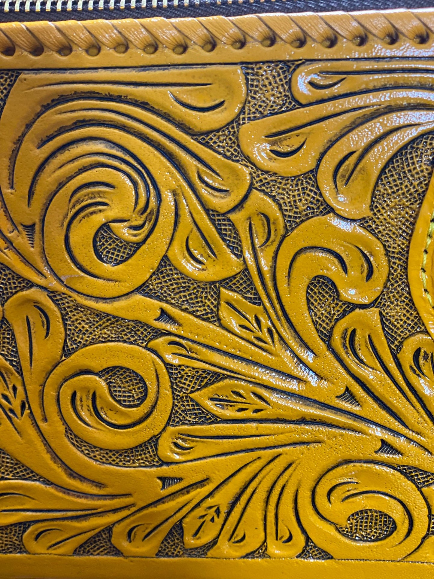 Yellow hand-chiseled leather purse