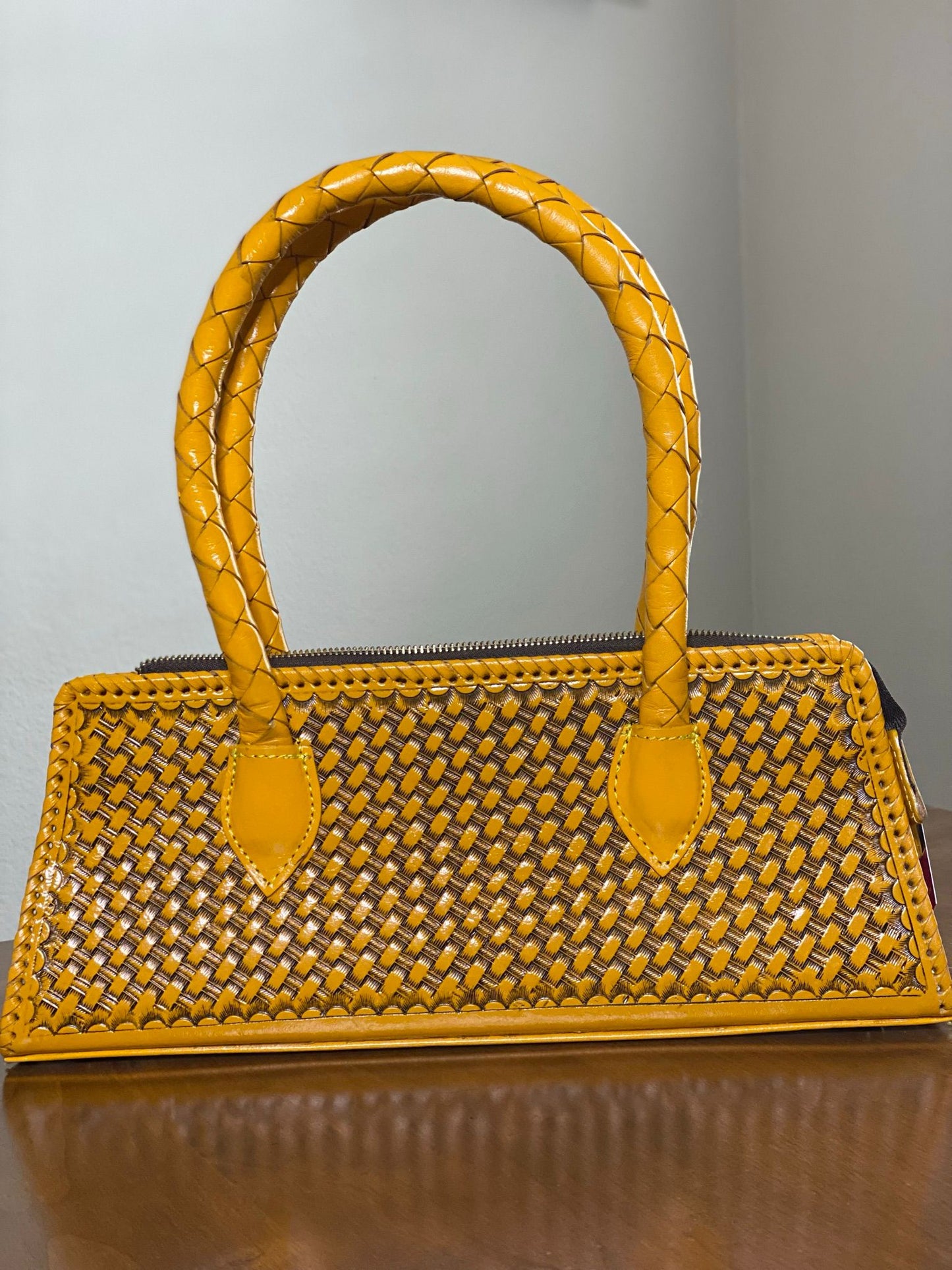 Yellow hand-chiseled leather purse